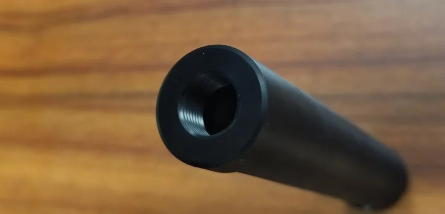 Black POM long cylindrical component with internal M15 end thread